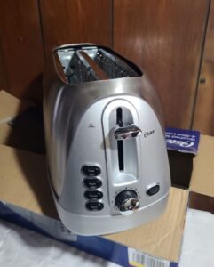 Oster TSSTTR6330-NP Long Slot 4-Slice Toaster User Manual